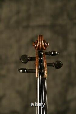 An old Antique Vintage violin with label of Stradivarius. Listen The Sound Sample
