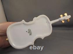 Figure nue en porcelaine Rosenthal ancienne sur un violoncelle Liebermann