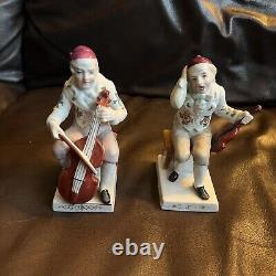 Figurine musicale en porcelaine antique - Homme jouant du violoncelle et violon - Lot de 2