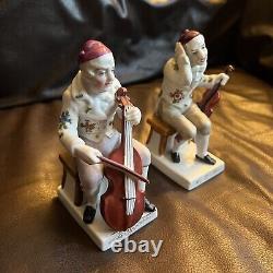Figurine musicale en porcelaine antique - Homme jouant du violoncelle et violon - Lot de 2