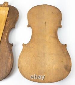 Formes de luthier en bois décoratif d'un violon ancien vintage