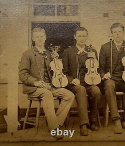 Photographie de carte de visite CDV d'un groupe de cordes de violon ancien original avec cithare